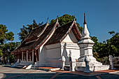 Luang Prabang, Laos - Wat Khili, a white vihan that houses an exhibition of photographs. 